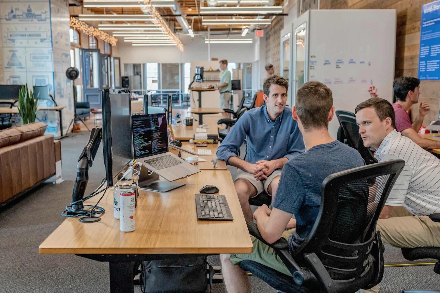Commercial technology team working together in a modern office